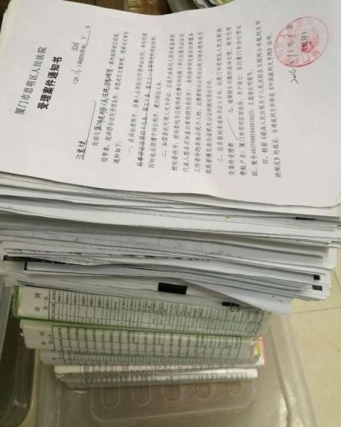 厦门市思明区法院受理了江先路家属提出的国家赔偿申请，家人为此准备将近4000页的证据材料。